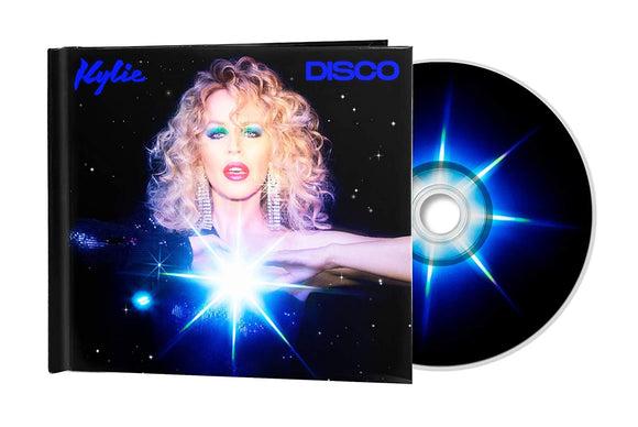 Kylie Minogue - Disco Deluxe Hardbook cover with 4 bonus tracks & Pictures